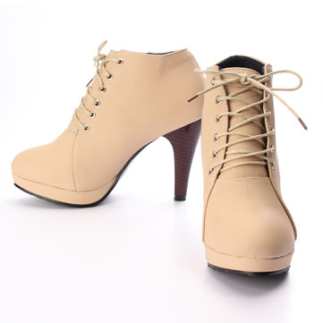 Lacez l'orteil rond les hautes chaussures de stylet de femmes de bottes de cheville de talon