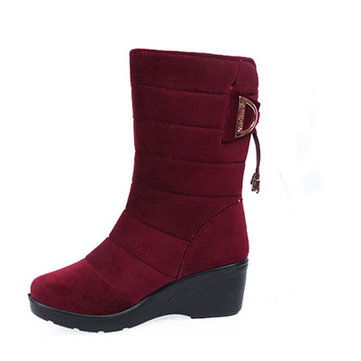 La nouvelle mode de femmes d'hiver les talons trapus le milieu des bottes de veau antidérapantes garde des chaussures de bottes de neige de cachemire chaudes